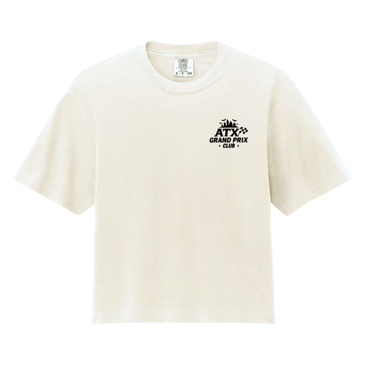 Beige t-shirt with black text and logo on a white background