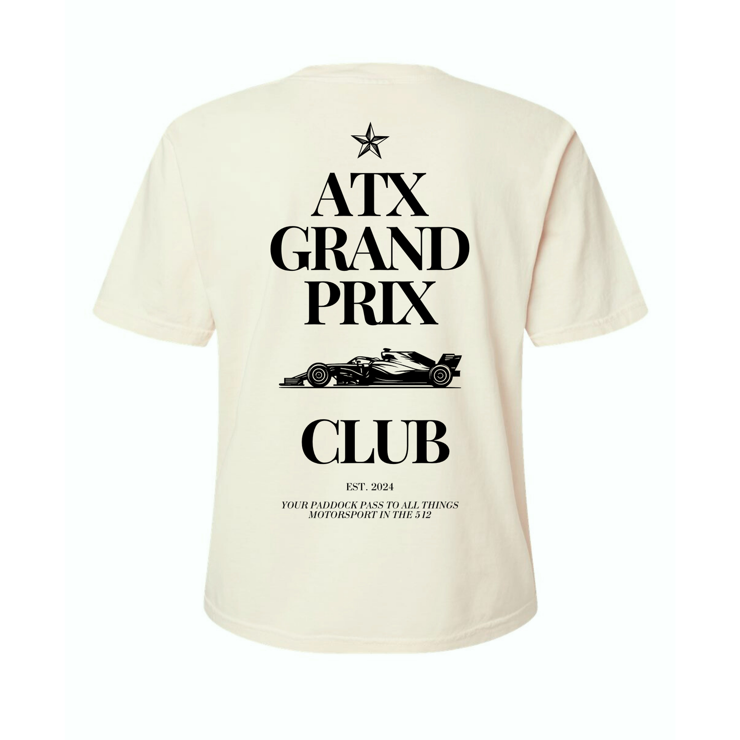 Beige t-shirt with black text and race car graphic on a white background